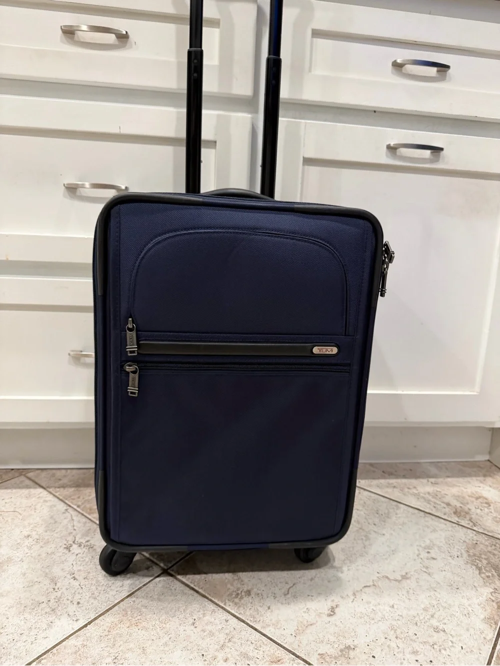 Tumi Navy Softside Carry-On Spinner